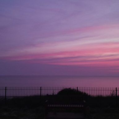 Pink sky over the sea.